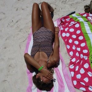 One piece bathing suit with open back